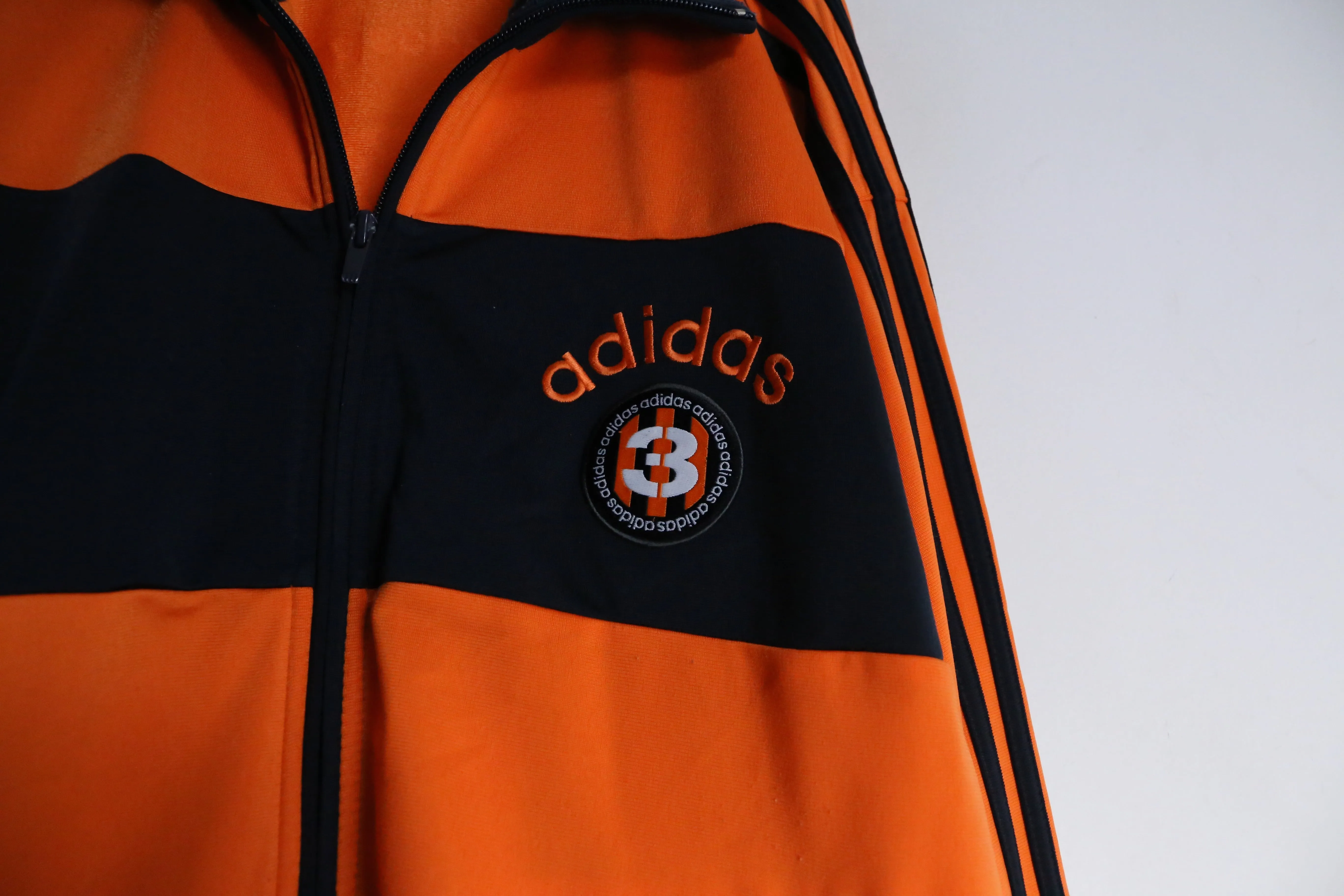 “adidas” orange×black track jacket